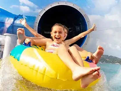 Child enjoying the NCL water slide