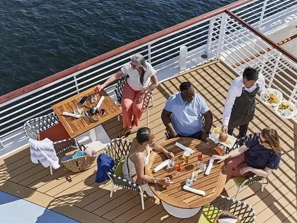 A group of friends dining on a SAGA Cruise