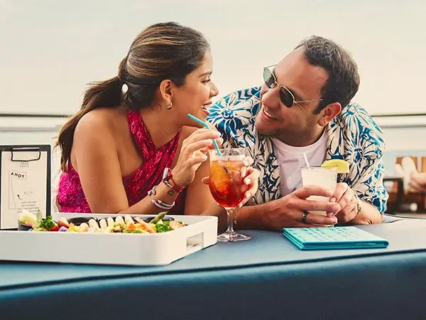 Couple relaxing on a Virgin Voyage