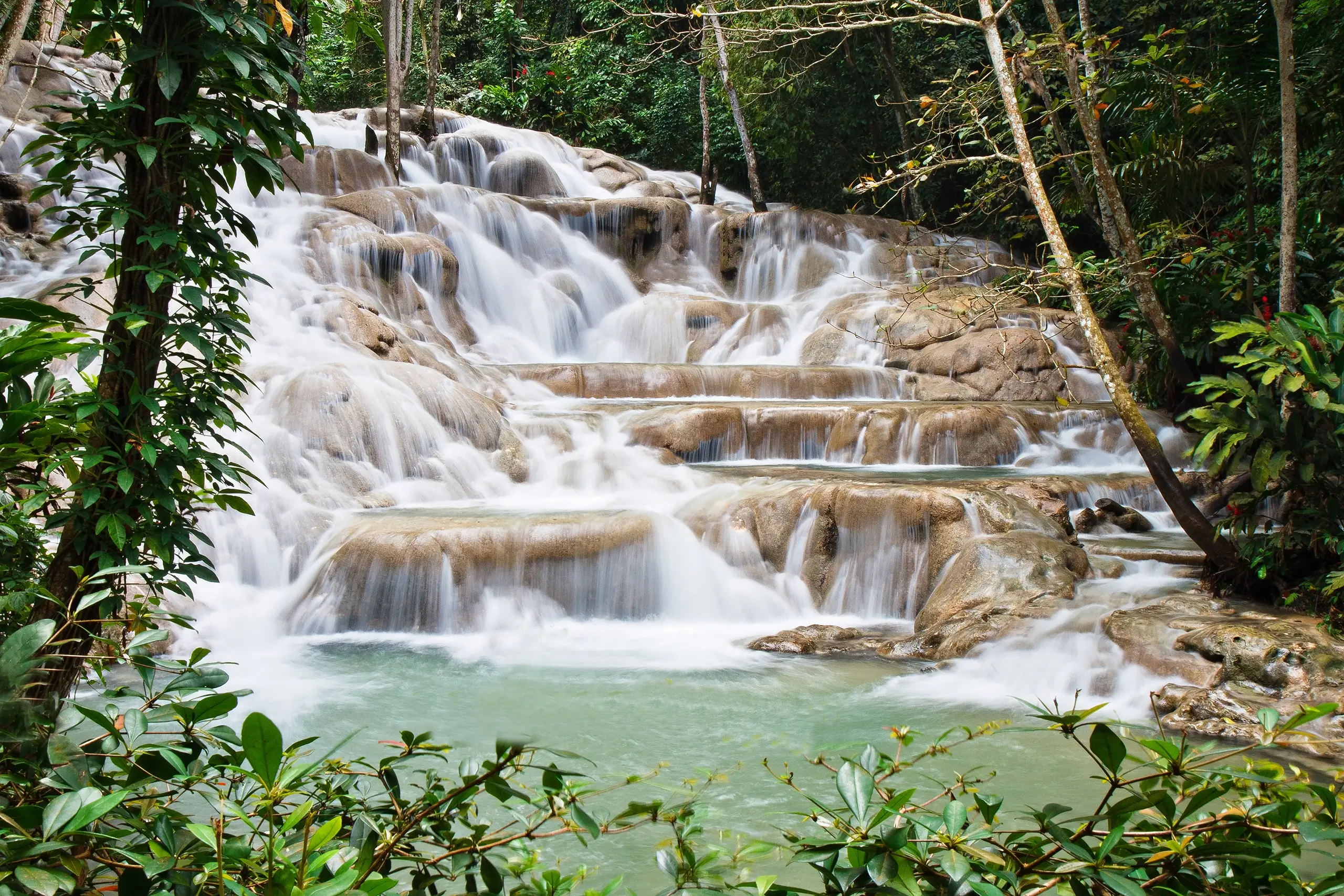 Enjoy a dip at Dunns River Falls, Jamaica