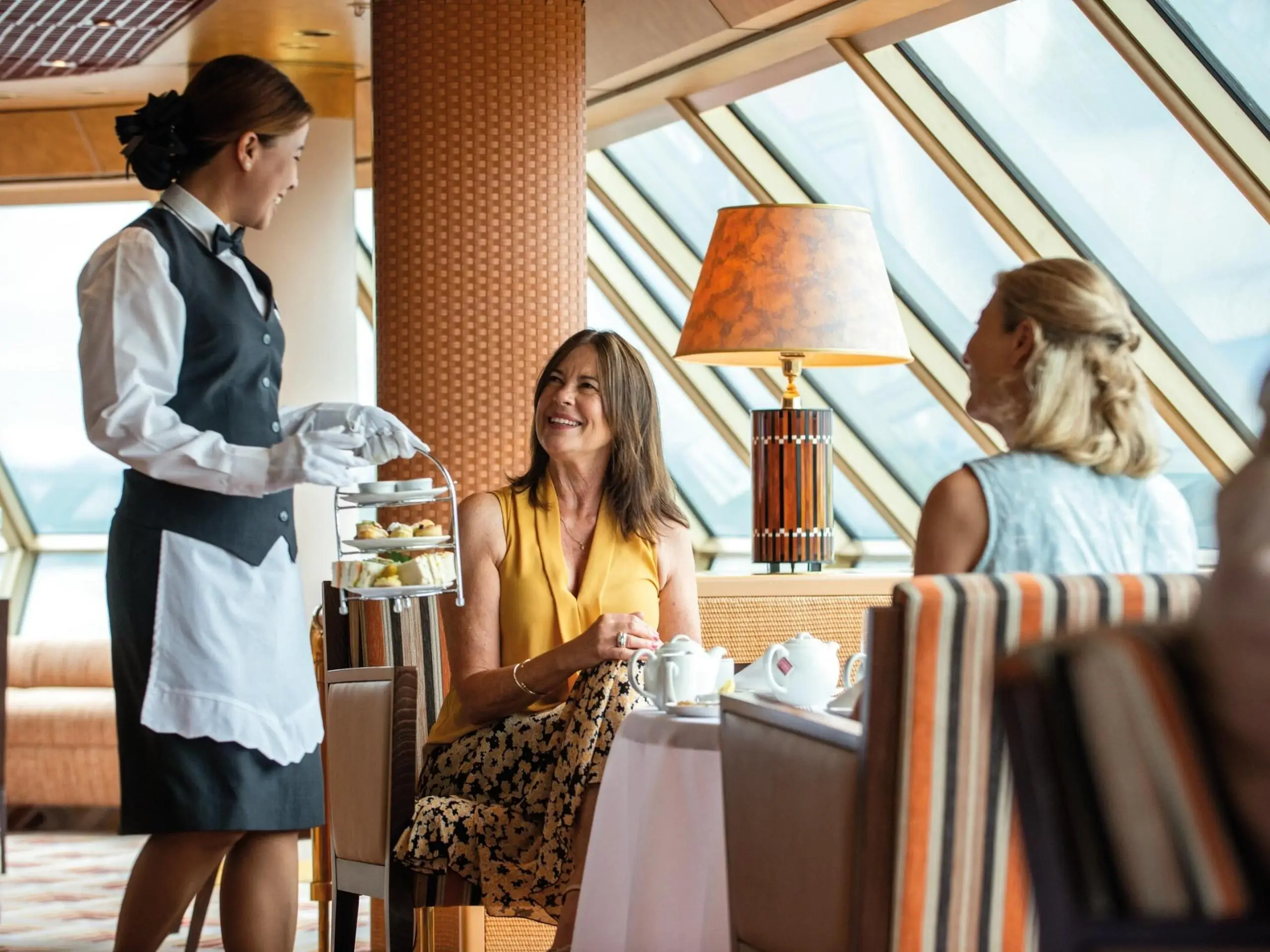 Enjoy Fred. Olsen's famous afternoon tea with friends